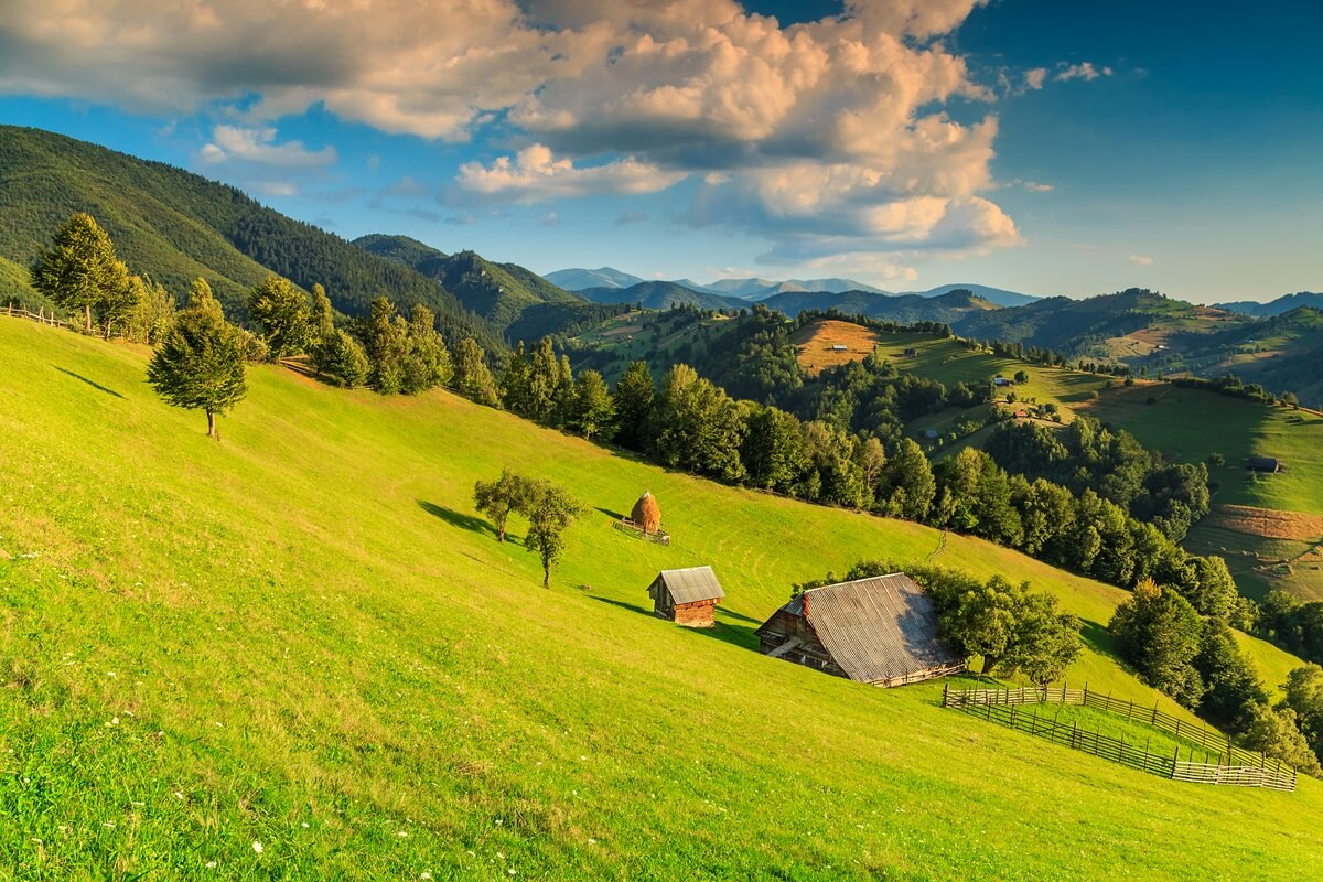 Landscape with green fields and valleys in Transylvania