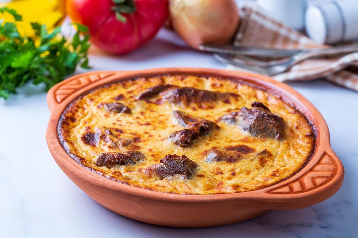 Tave kosi is a national Albanian dish of baked lamb and rice with yoghurt